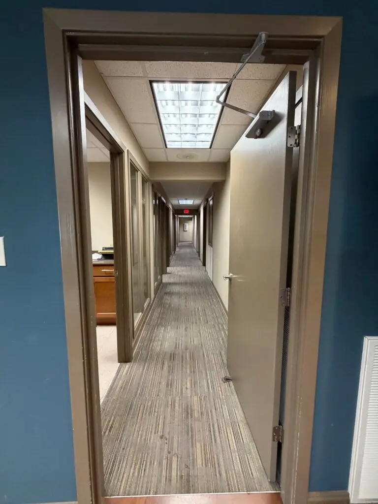 Boardroom Suites professional hallway in Metairie with private office entrances