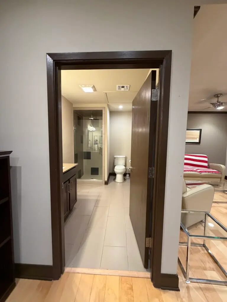 Boardroom Suites Suite 209 private bathroom in Metairie showing vanity and glass-enclosed shower
